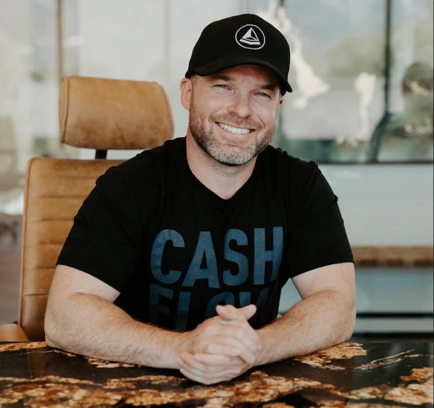 Ryan Lee, founder of Altitude Life, seated at a desk